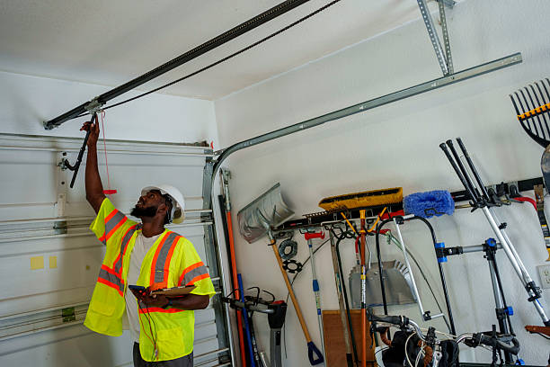 Professional Garage Door Maintenance technician working in Elmira Heights, NY